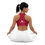 Thumbnail: Woman wearing Tina Flowers 2 - Sports bra with ponytail, white pants, sitting cross-legged.