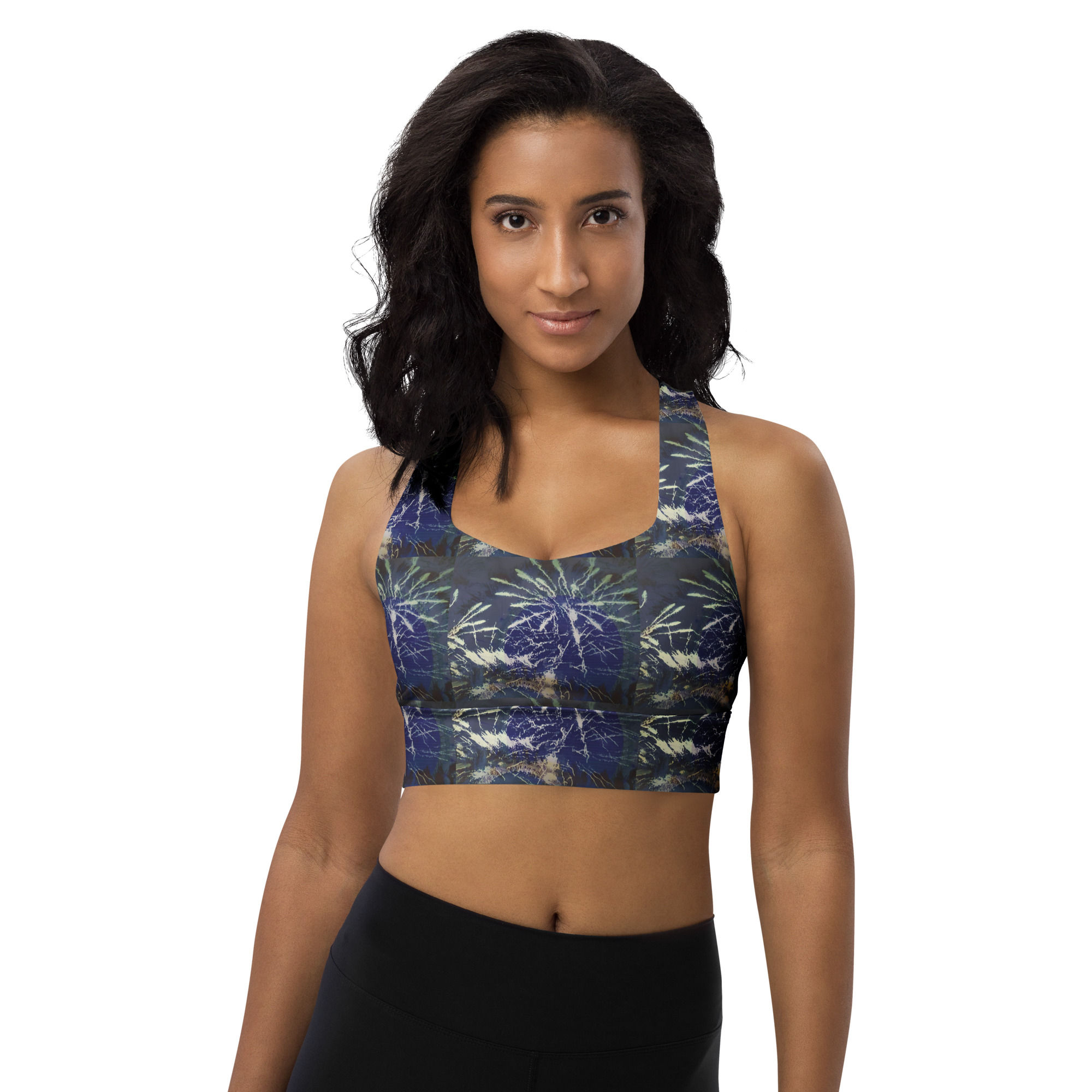 Woman wearing patterned sports bra, ArtDivaArt, activewear fashion, fitness apparel.