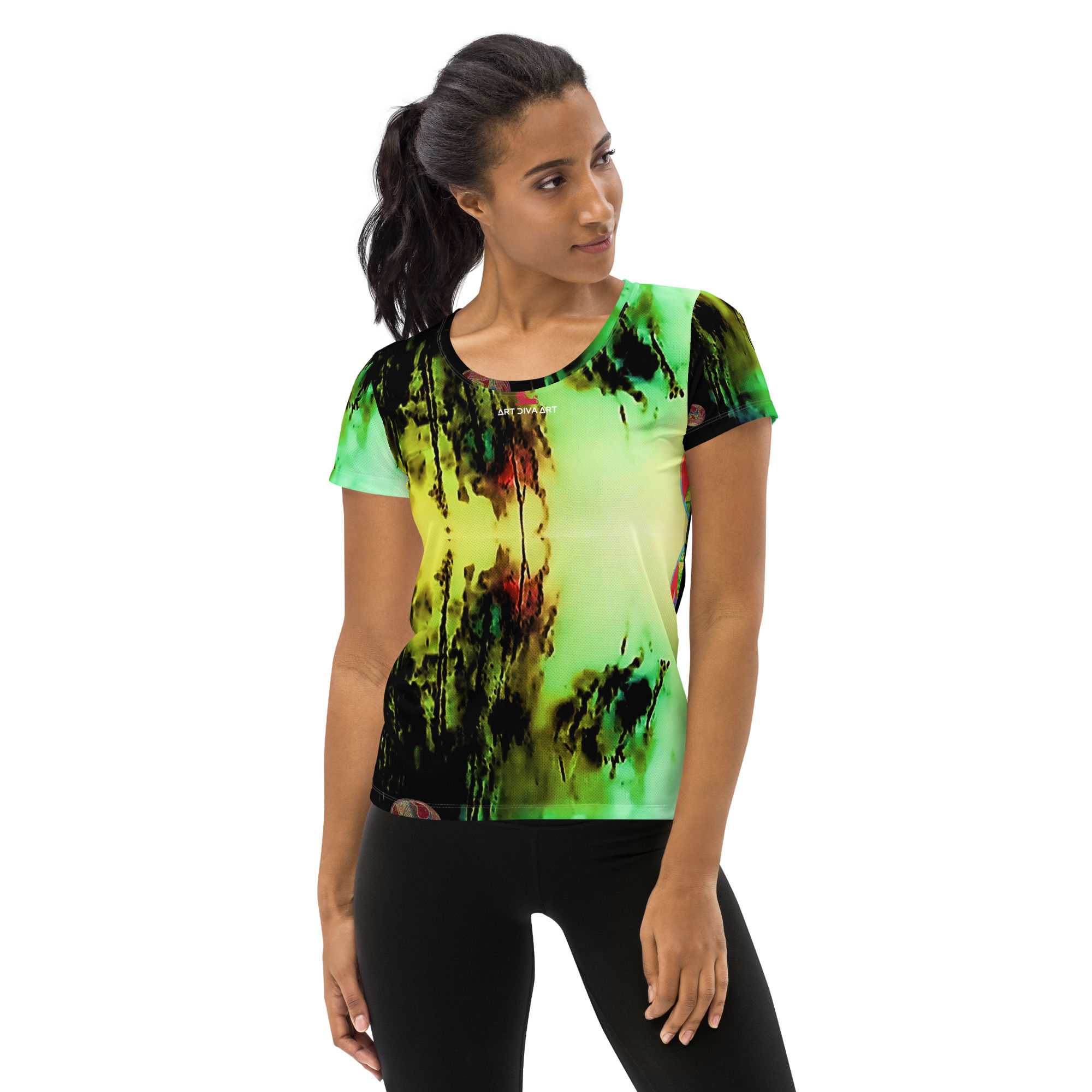 Woman wearing colorful t-shirt and black leggings, ArtDivaArt, active fit clothes.