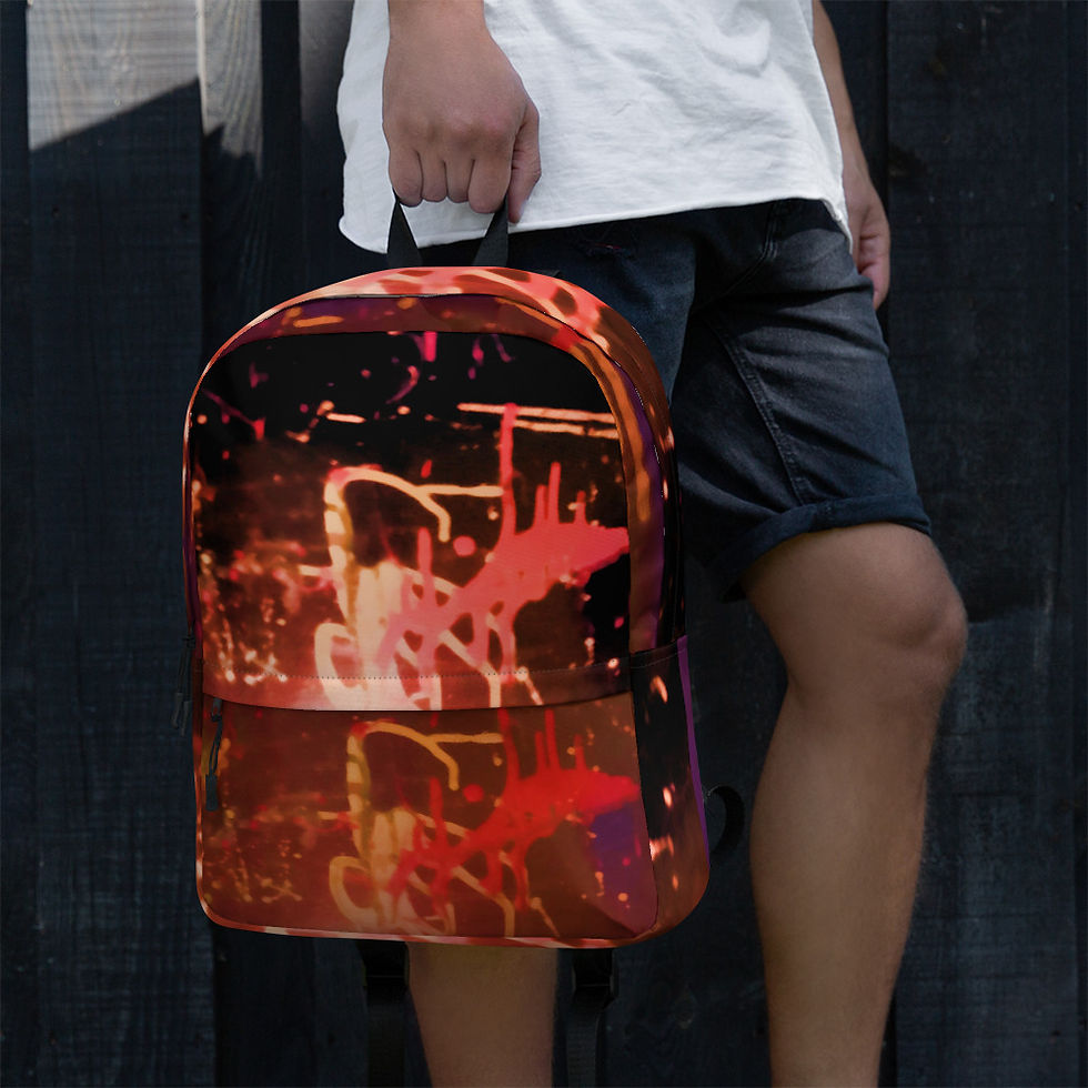 Thumbnail: Person holding a backpack with red design against a dark wooden background. ArtDivaArt