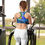Thumbnail: Woman wearing colorful sports bra on elliptical machine, ArtDivaArt and exercising.