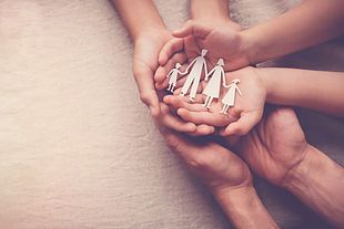 hands holding paper family cutout, family home, foster care, world mental health day, Auti