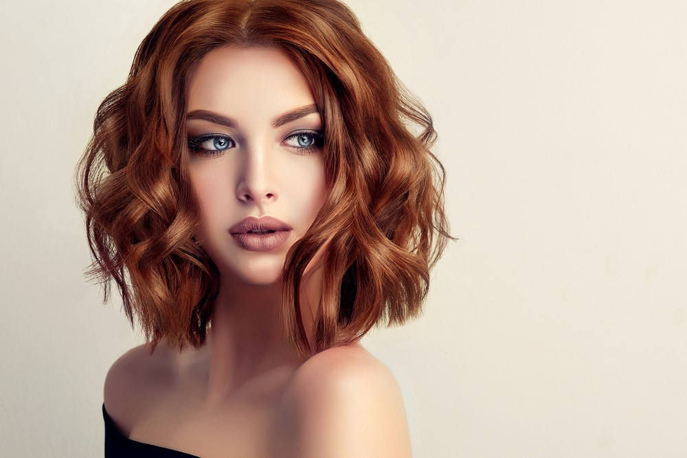 Lady with Short Wavy Red Hair