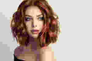 Lady with Short Wavy Red Hair
