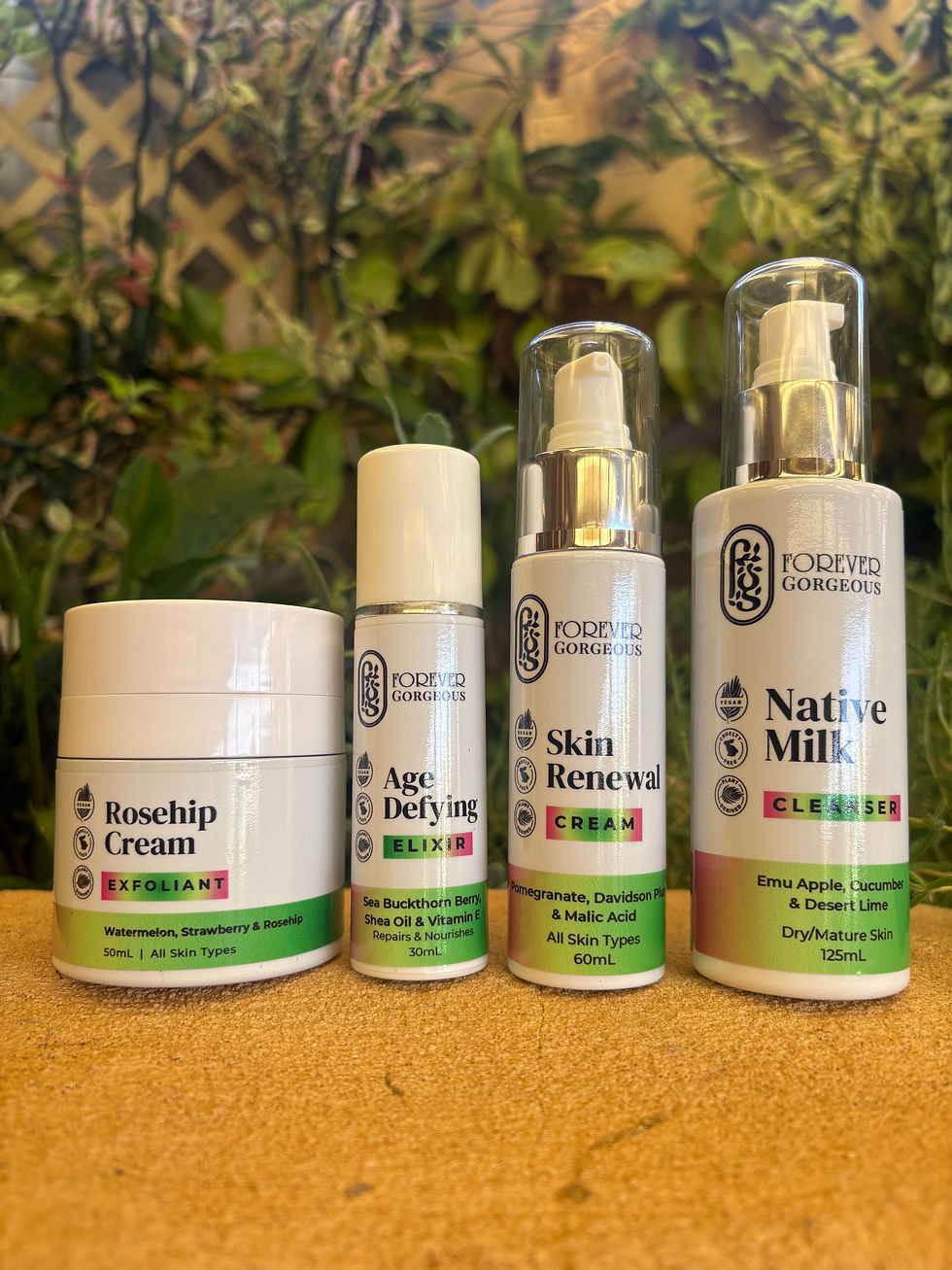 Close-up view of natural skincare products arranged on a wooden surface