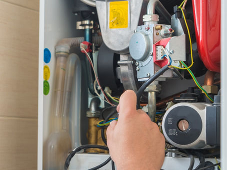 A modern furnace showing key components, highlighting what is the most expensive part to fix on a furnace, with expert furnace repair, replacement, and heating maintenance services by Coastal Heating and Cooling in Orange County. Trust us to help you with what is the most expensive part to fix on a furnace, furnace repair cost, furnace replacement cost, heating system repair, furnace maintenance, furnace troubleshooting, common furnace problems, furnace repair near me, heating repair near me, furnace installation, furnace inspection, HVAC repair, HVAC maintenance, furnace blower motor repair, heat exchanger replacement, ignition system repair, furnace not heating, emergency furnace repair, residential furnace service, commercial furnace service, heating system tune-up, furnace service near me.