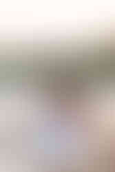 Golden hour engagement photography at Frenchman’s Bay featuring natural candid moments by the lake