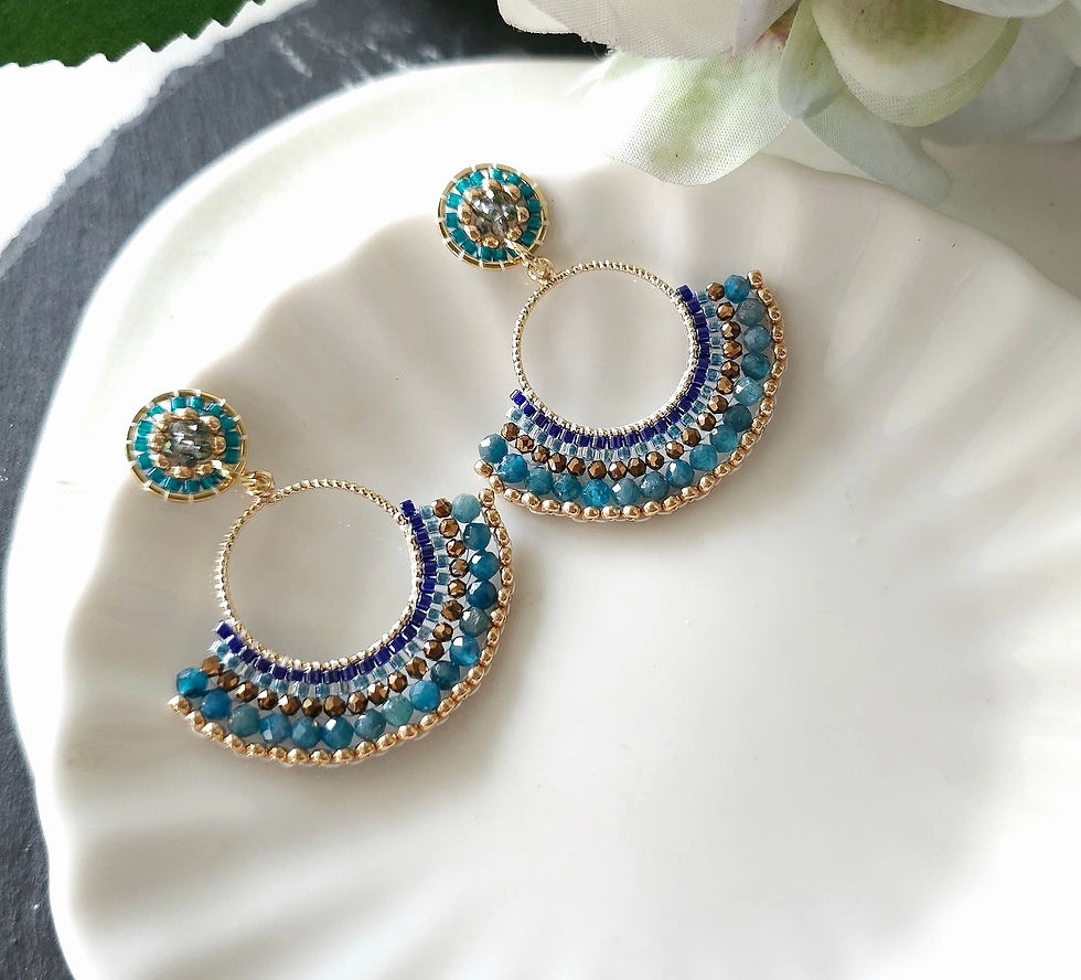 Thumbnail: Hand beaded hoop earrings with Apatite beads