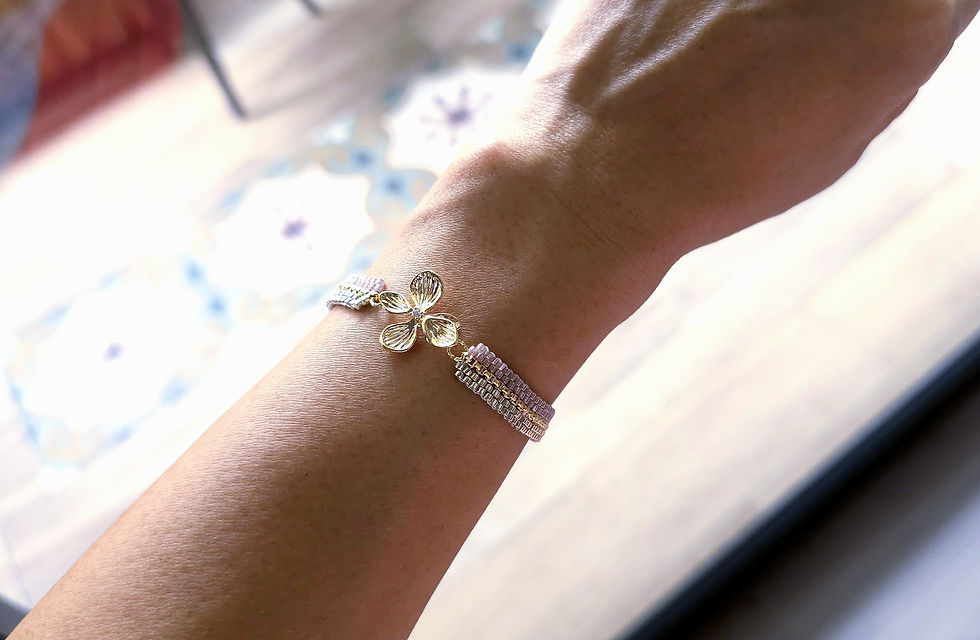 Thumbnail: Hand beaded bracelet with floral charm