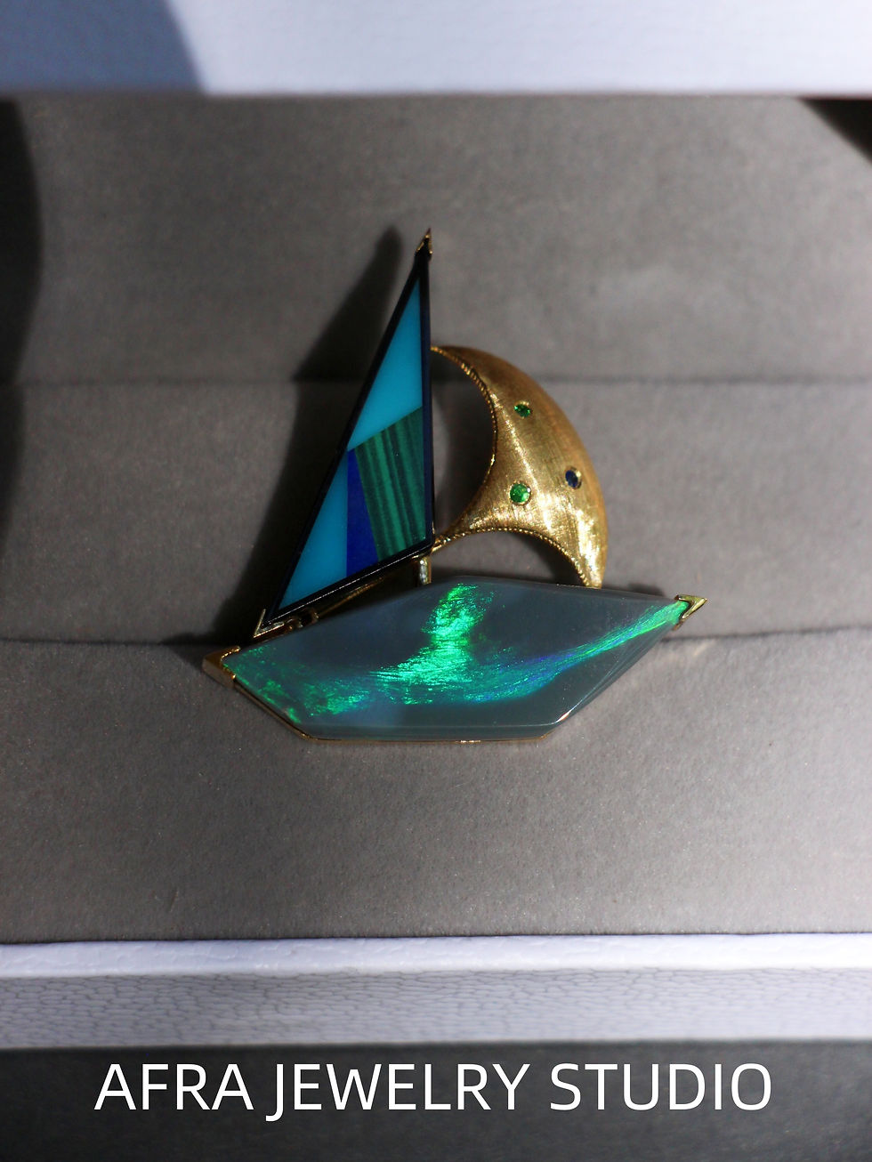 Thumbnail: 18K Gold Black Opal Sailboat Brooch: Sapphire, Tsavorite & Gem