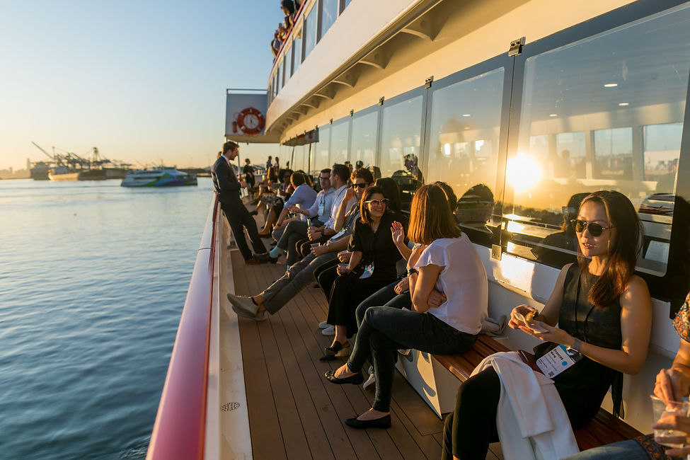 Charter guests on the outer deck of Enhydra