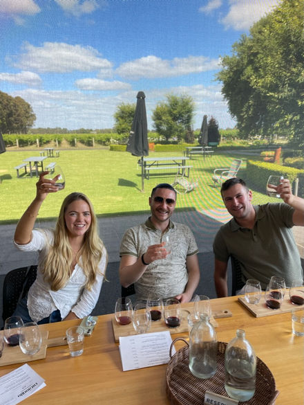 Group enjoying a wine tasting at Di Giorgio Family Wines surrounded by Coonawarra vineyards
