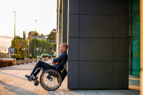 Disabled business man waiting