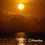 Miniatura: Entardecer Dourado no Rio Amazonas com Silhueta de Navio Cargueiro