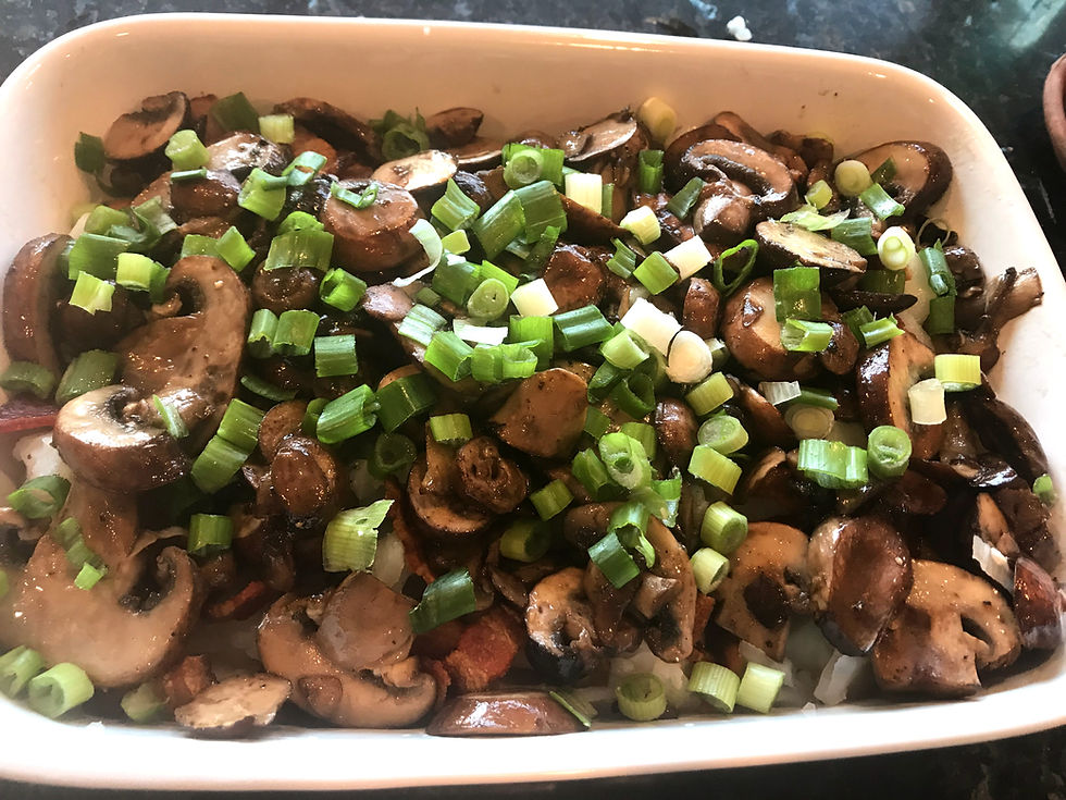 Layering cod, bacon, mushrooms and scallions for baked cod