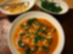 West African Peanut Stew with Peanuts and Fresh Coriander Garnish