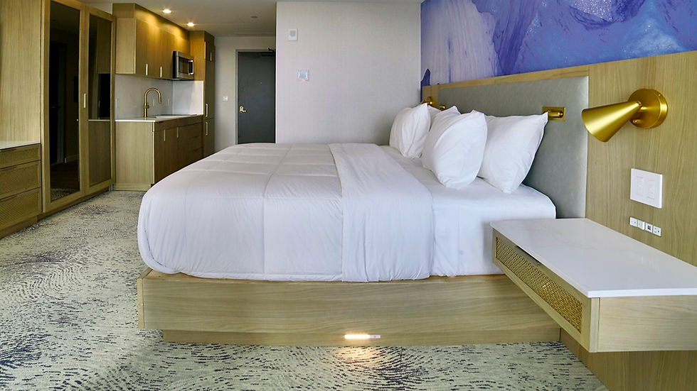 Guest room with pillowtop bed and kitchenette at Iris Hotel Boston in Coolidge Corner