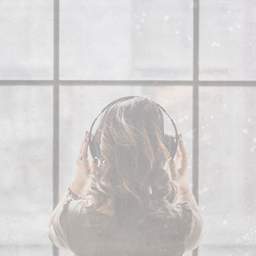 Woman Wearing Headphones_edited.jpg