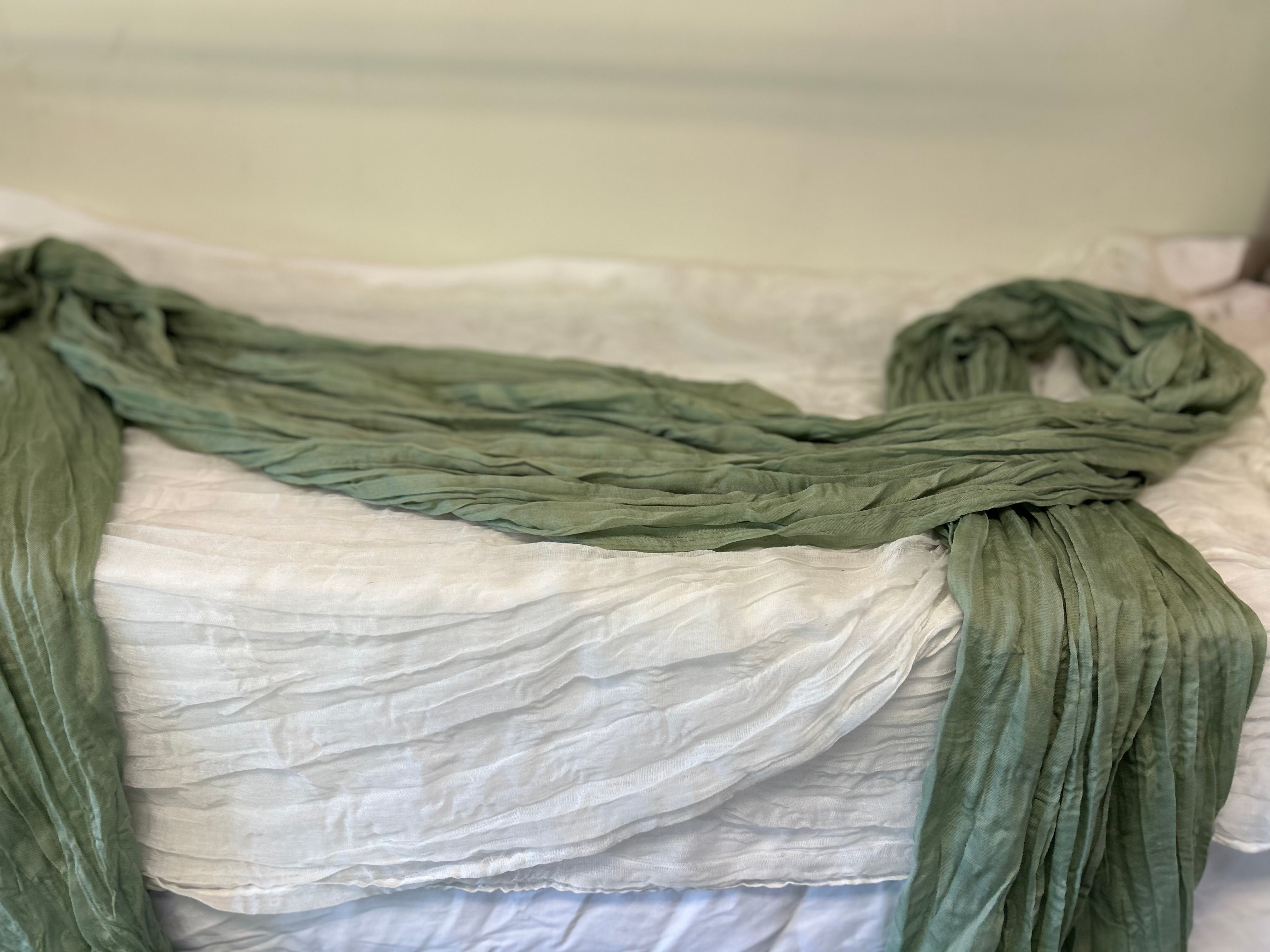 Light green cheesecloth table runner