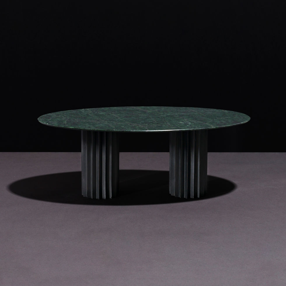 Thumbnail: Sculptural dining table with double cast blackened bronze Doric pedestals and oval Serpentino green stone top.