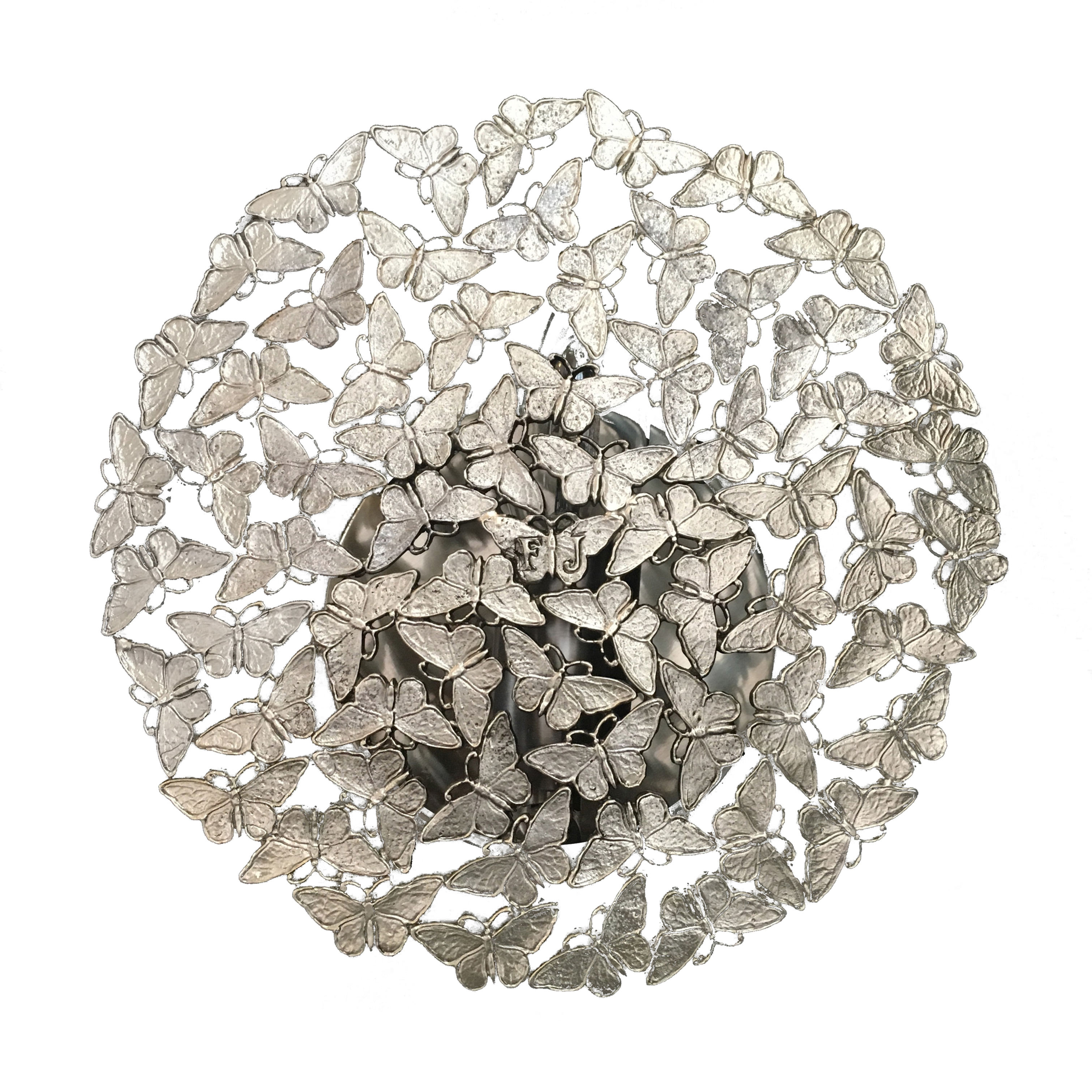 The Johnnie wall sconce is a delicate silver disc formed from intricately cast butterflies in white bronze