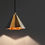 Thumbnail: The Raffaele pendant light features a unique sand-cast brass lampshade shaped like a three-dimensional star