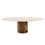 Thumbnail: Sculptural dining table with a cast bronze Doric pedestal and oval travertine stone top.