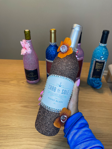 Hand-glittered wine bottles