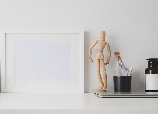 white-wooden-frame-on-white-table-377342