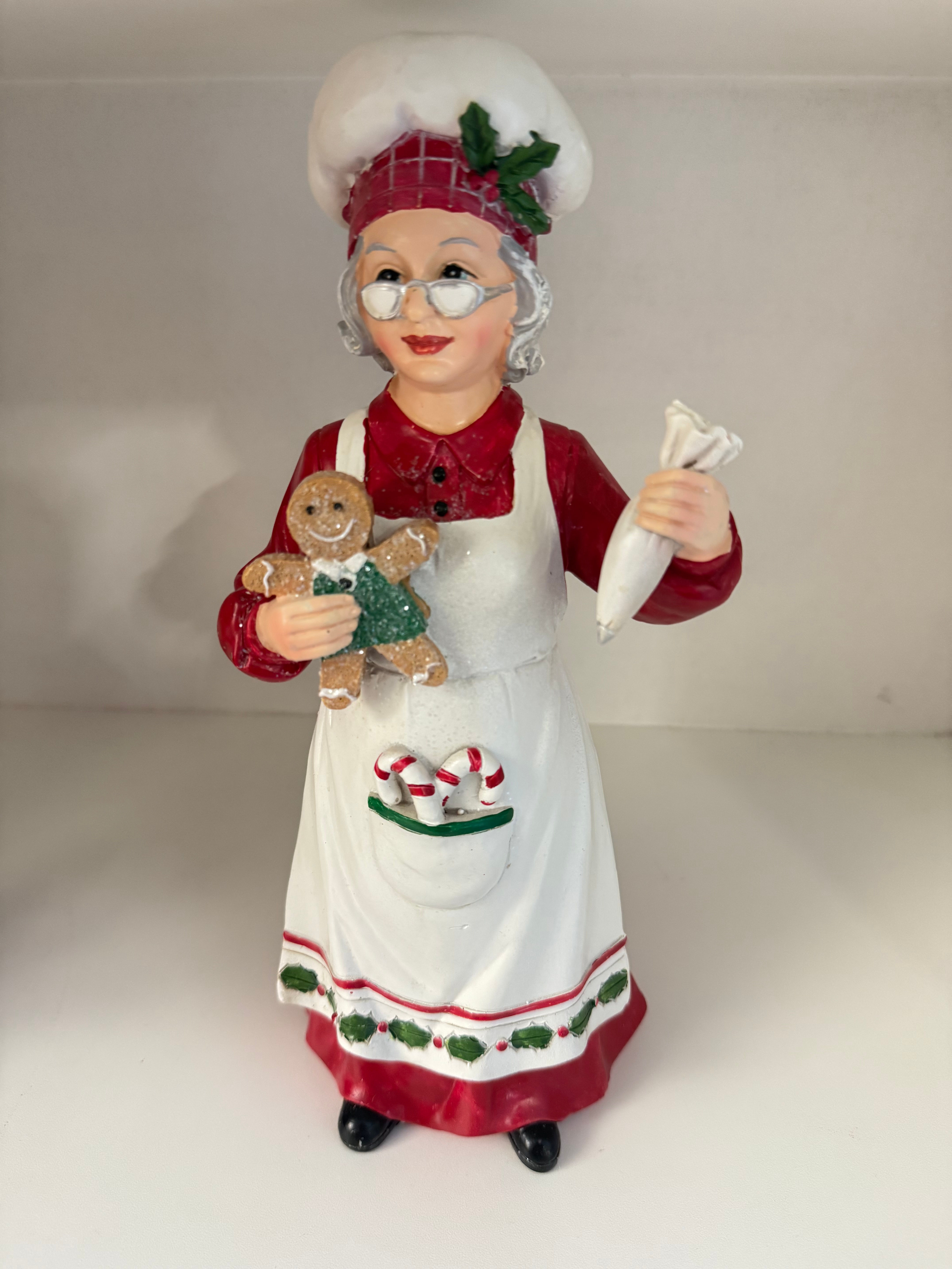 Mãe Natal pasteleira com saco pasteleiro