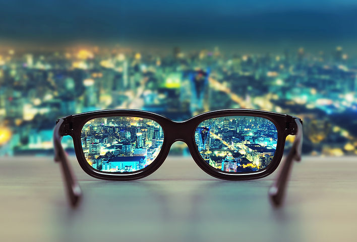 Night cityscape focused in glasses lenses.jpg