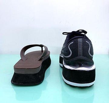 Compensação de sapatos e sandálias