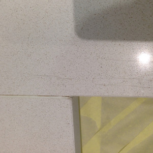 Scratched White Quartz Worktop.jpeg