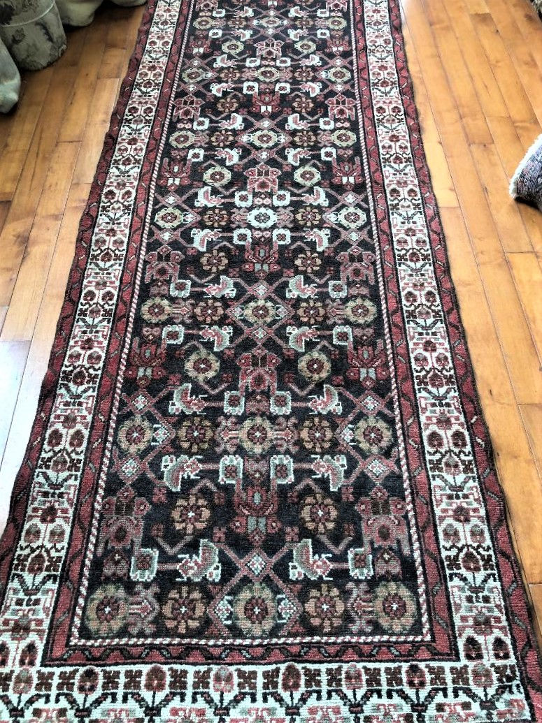 Hand-woven with exquisite detail, our Persian Malayer Runner Rug 3'4" x 9' showcases the timeless elegance of wool and cotton