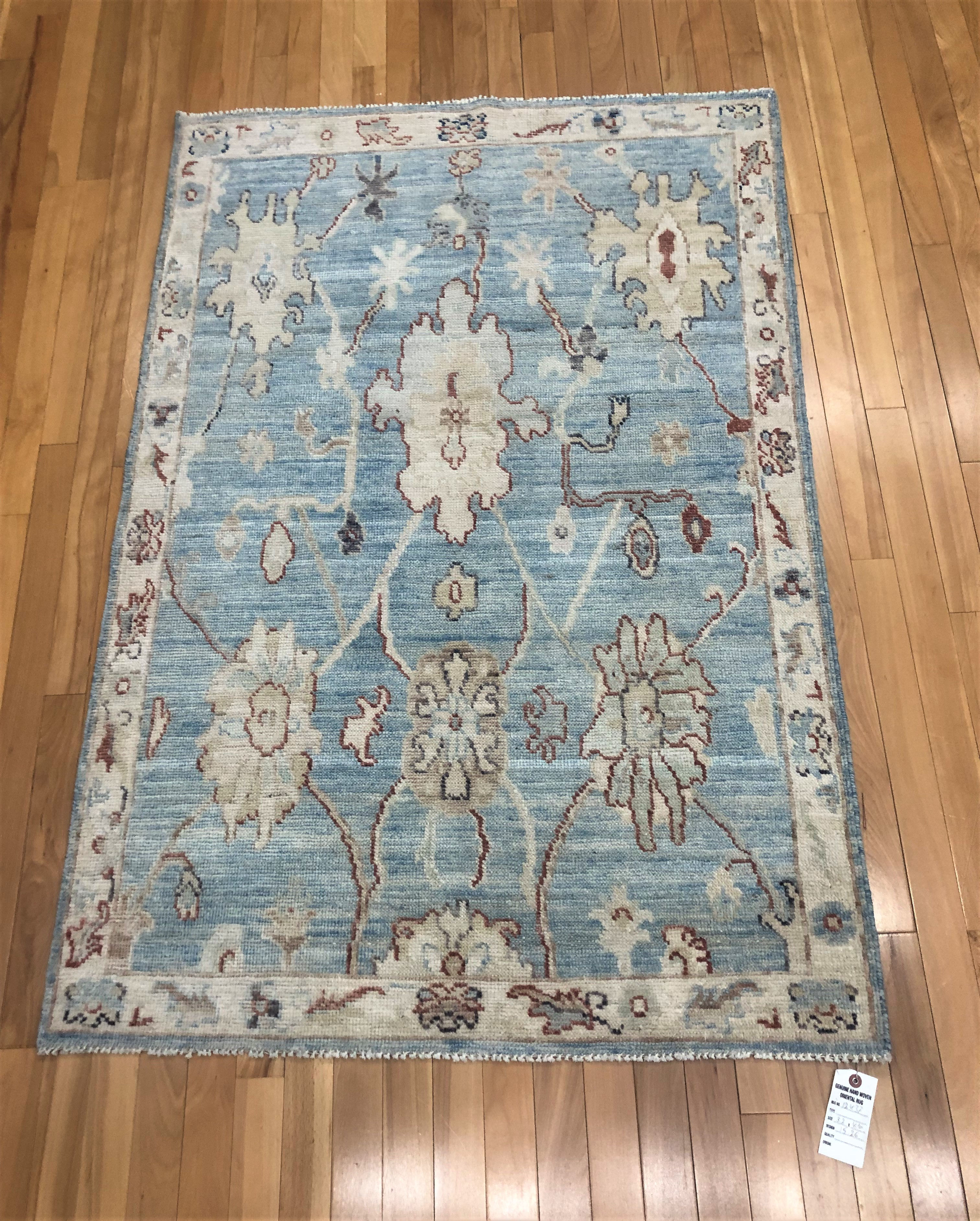 Afghan Oushak Rug, measuring 3'2" x 4'10". Expertly hand-woven with a luxurious wool pile and durable cotton foundation,