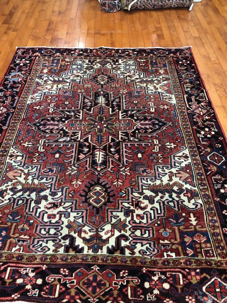 Persian Heriz Rug, hand woven from the finest wool, measuring 6'4" x 8'2".