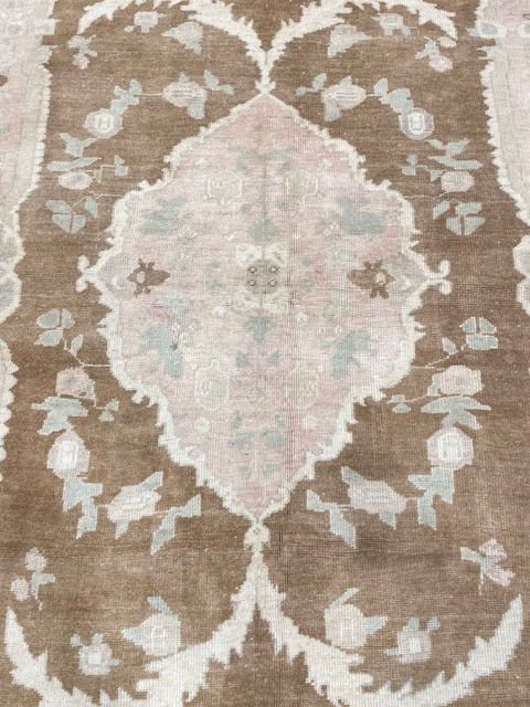 Thumbnail: Oushak Turkish Rug 4'5" x 8'3"at Persian Gallery of Nashville. This hand-woven piece of wool and cotton is durable and soft.