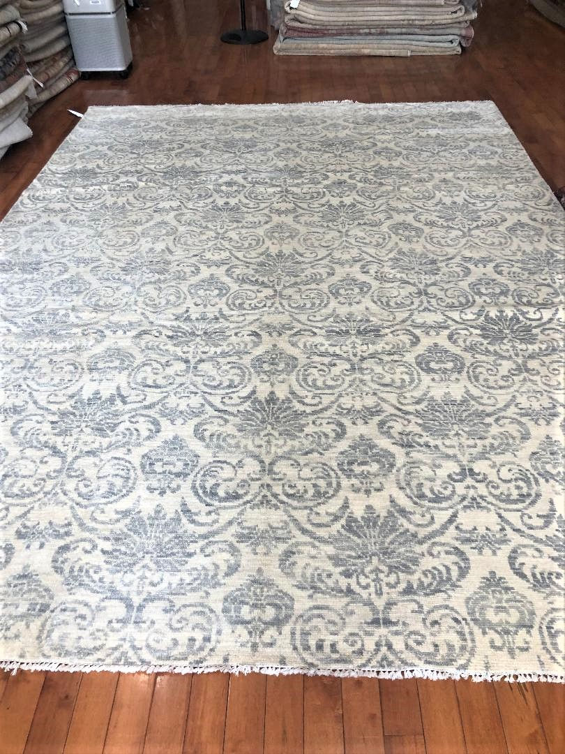 9'1" x 12'4" Indian Tribal Rug, meticulously hand woven from premium wool and cotton.