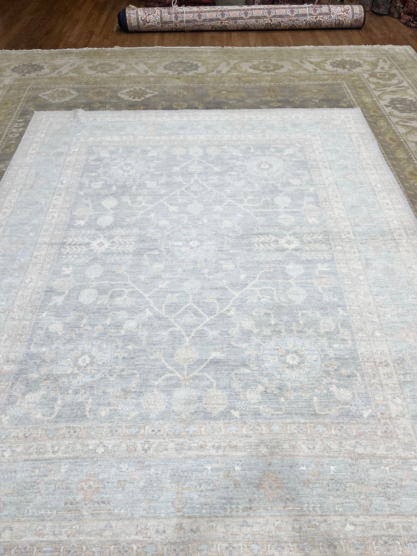 Pakistan Oushak Rug 8'2" x 9'9", hand woven with wool pile and durable cotton foundation.