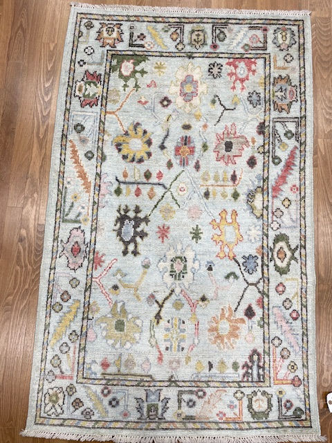 hand-made Oushak Turkish rug, 3' x 4'10", featuring a classic Anatolian design and soft wool.