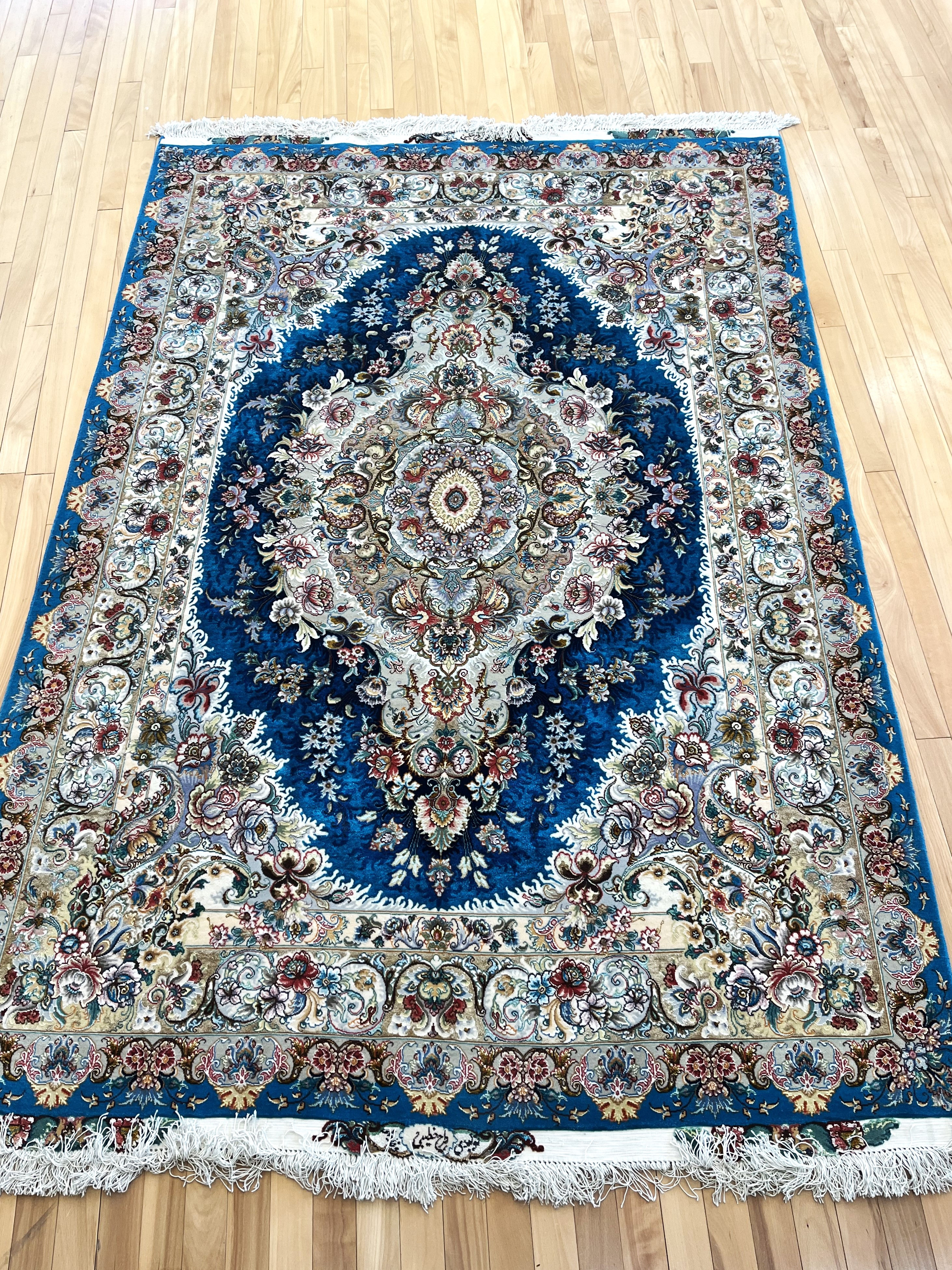 Tabriz 4'11" x 7'1"