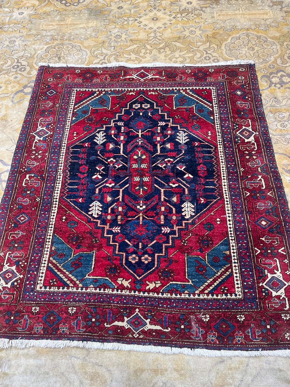 Persian Heriz Rug 4'8" x 5'8" is a hand-woven masterpiece of fine wool,