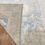 Thumbnail: hand-woven Oushak Afghan Rug, measuring 9'8" x 13'5". Crafted from a luxurious blend of wool and cotton,