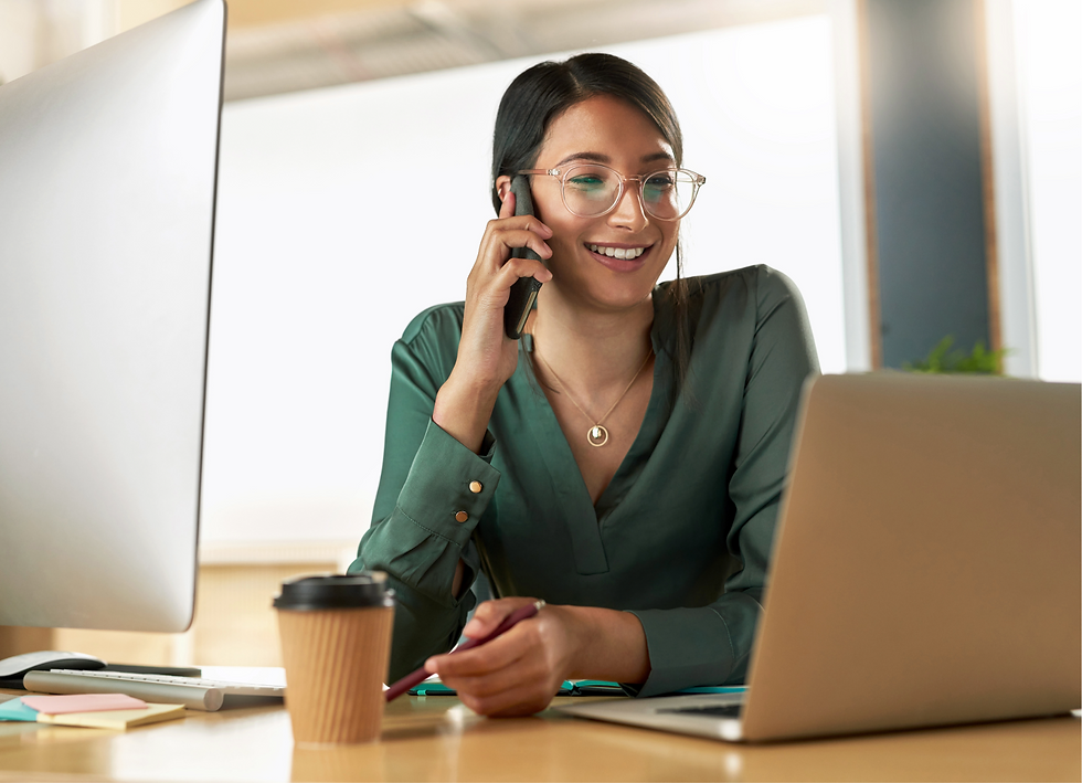 Professional woman on phone discussing credit union jobs.