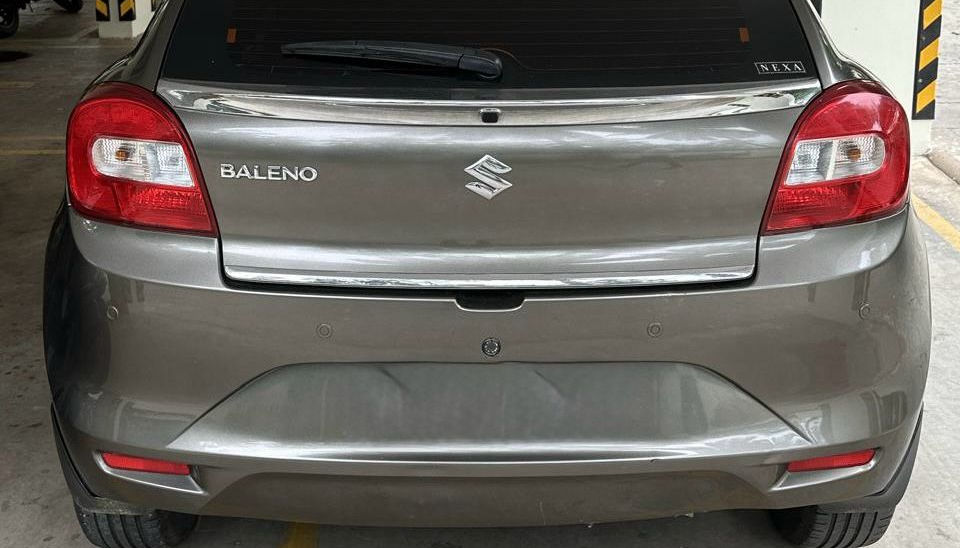 Rear view of a Suzuki Baleno for Tirupati car hire