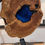 Thumbnail: "Tear of Venus”  Aged Olive Wood disc with Deep Blue and Green Epoxy Pools