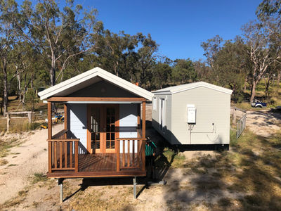 Tiny homes ready to be transported by truck