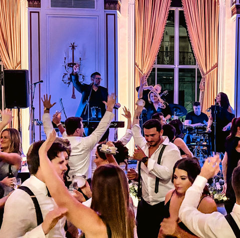 Wedding reception with people dancing and enjoying life 