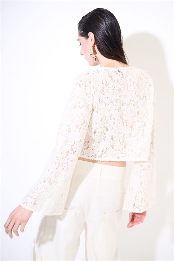 Thumbnail: Blusa in pizzo con laccetti burro
