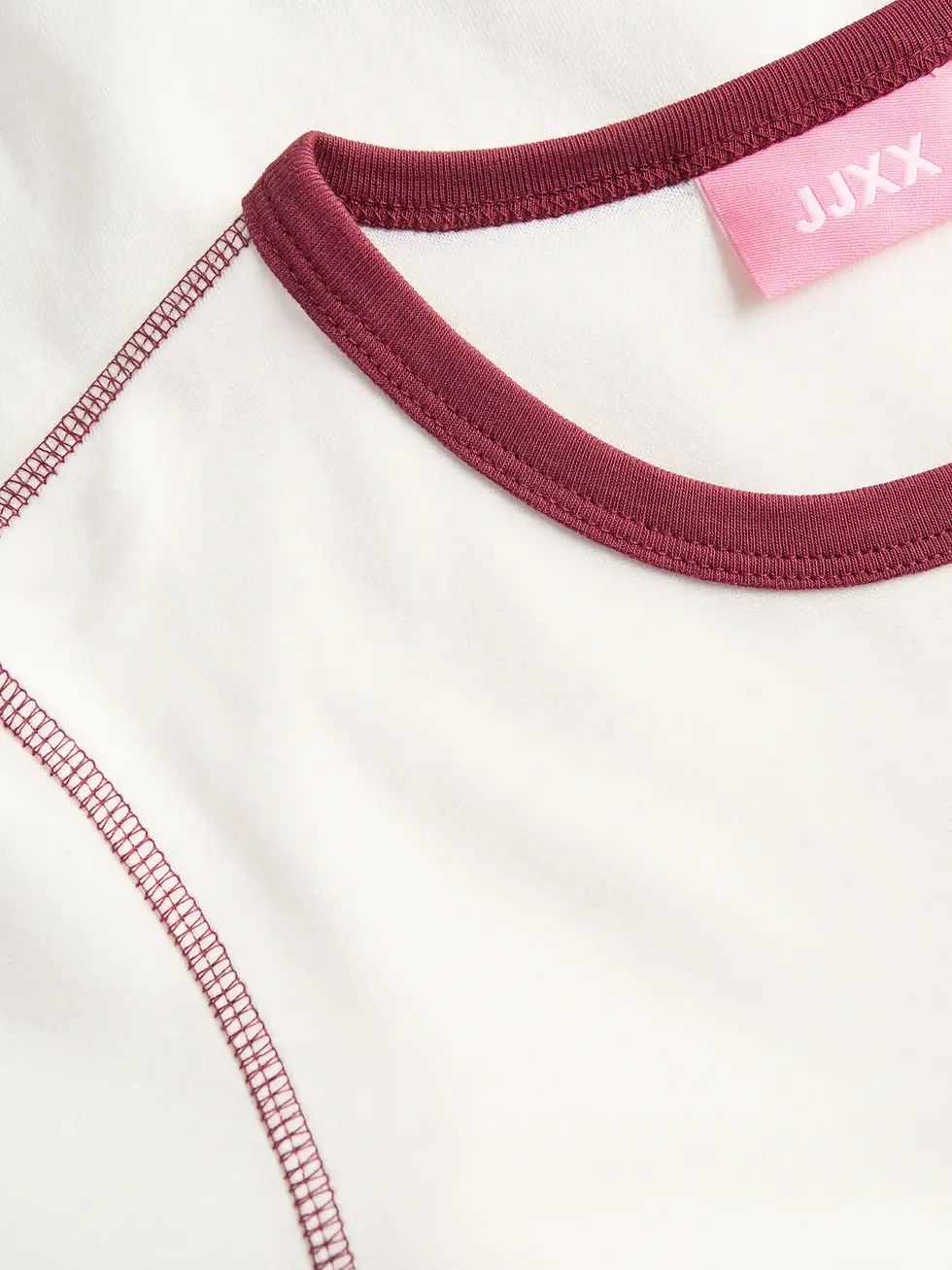 Thumbnail: maglia panna stretch con bordi vinaccia a contrasto